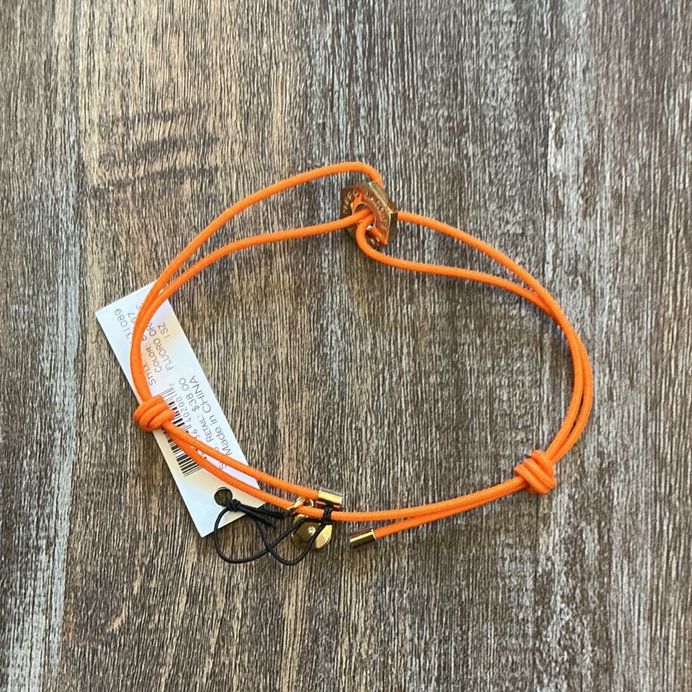 Marc Jacobs Vibrant Orange Bracelet with Gold Charm
